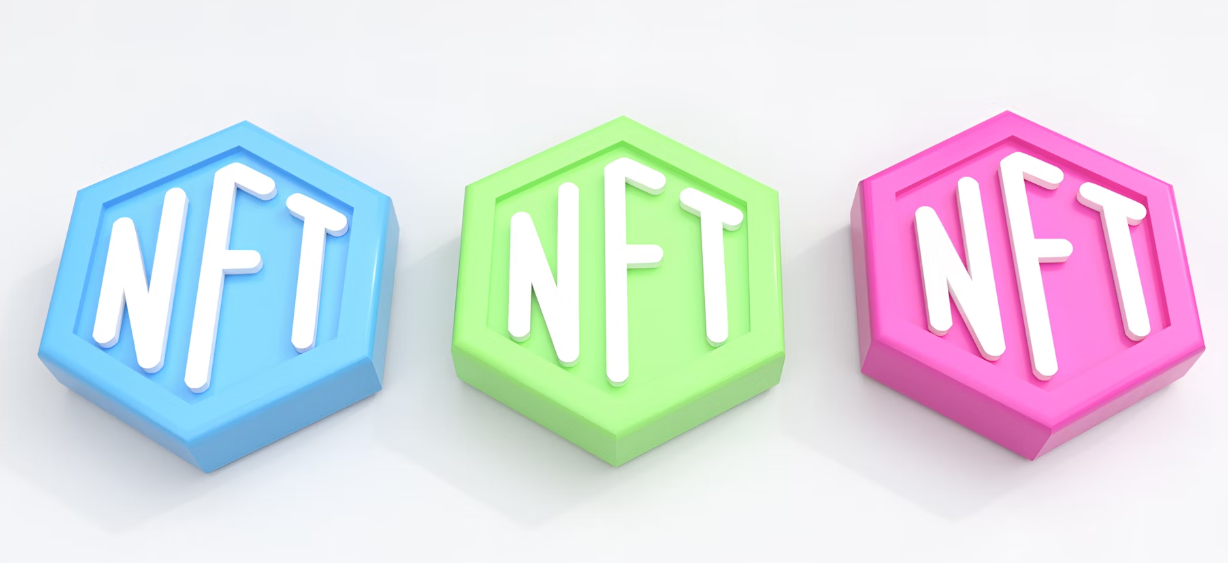 Three 3D NFT token icons in blue, green and pink hexagons